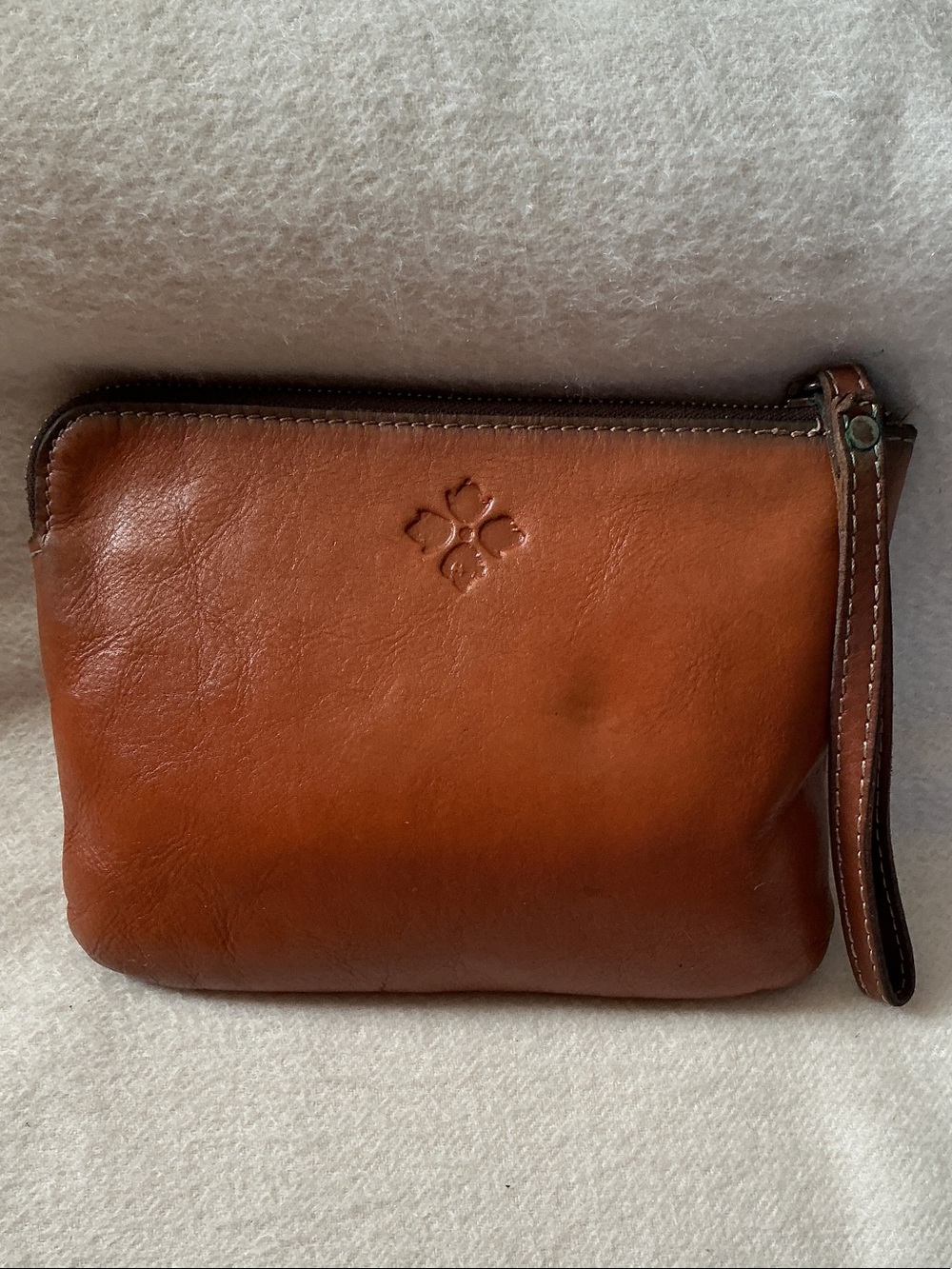 Patricia Nash Cognac Leather Mini Wristlet with Embossed Clover